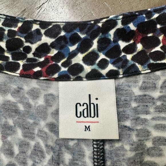 CAbi Sleeveless Top with Twist Keyhole Accent. - Picture 2 of 5